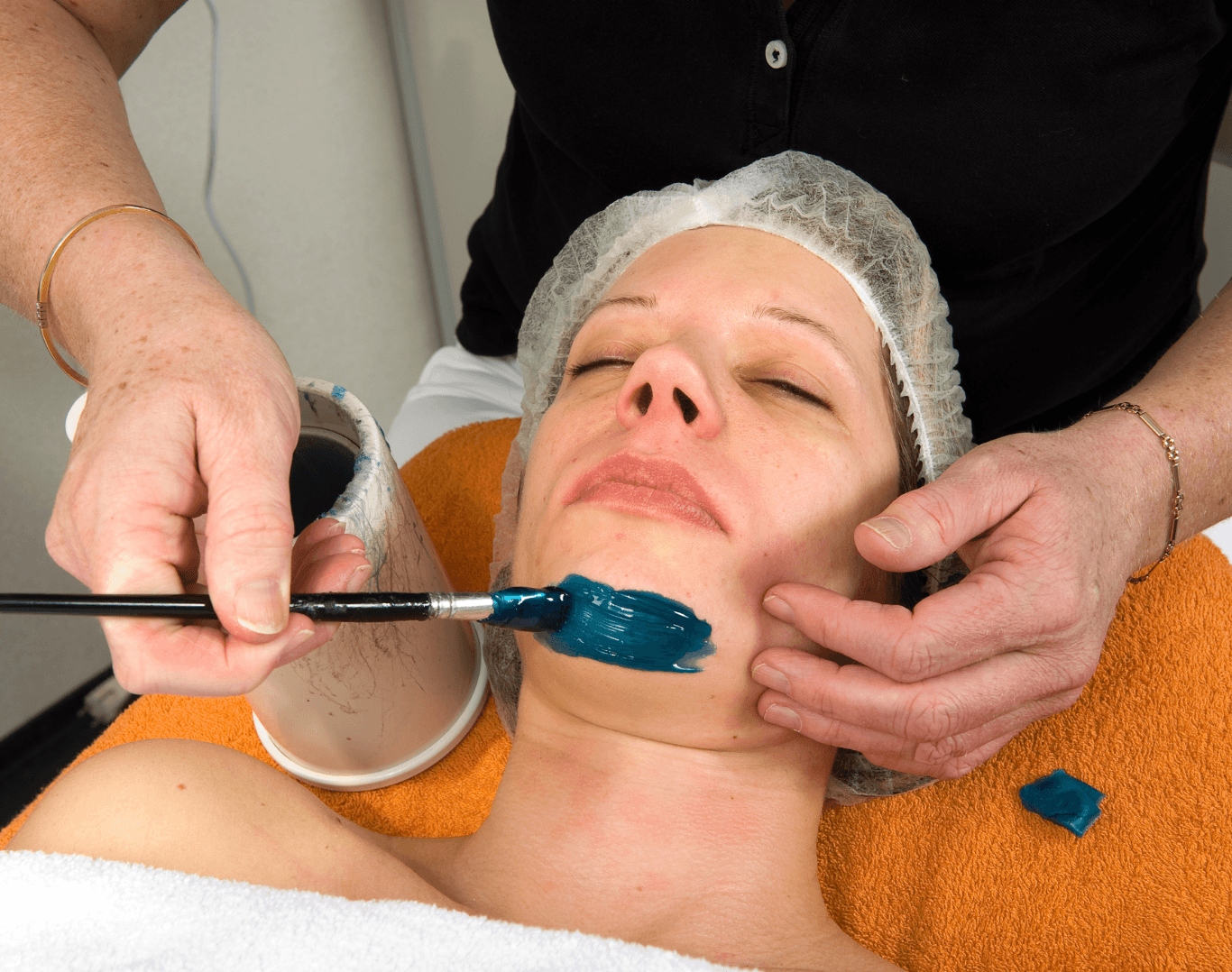 Woman receiving a precise chin waxing treatment at Directors Cut Hair, Nails and Beauty, Crystal Peaks, Sheffield