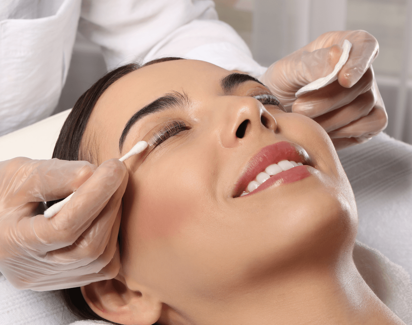 Smiling woman receiving a professional eyelash tint at Directors Cut Hair, Nails and Beauty, Crystal Peaks, Sheffield