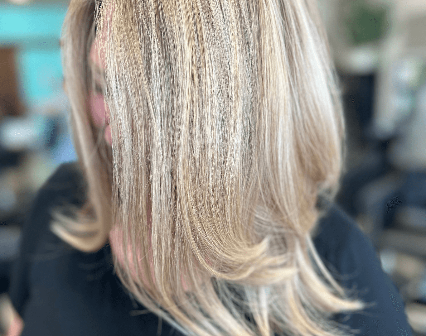 Close-up of fresh foil highlights at the parting (T-bar) at Directors Cut Hair, Nails and Beauty, Crystal Peaks, Sheffield