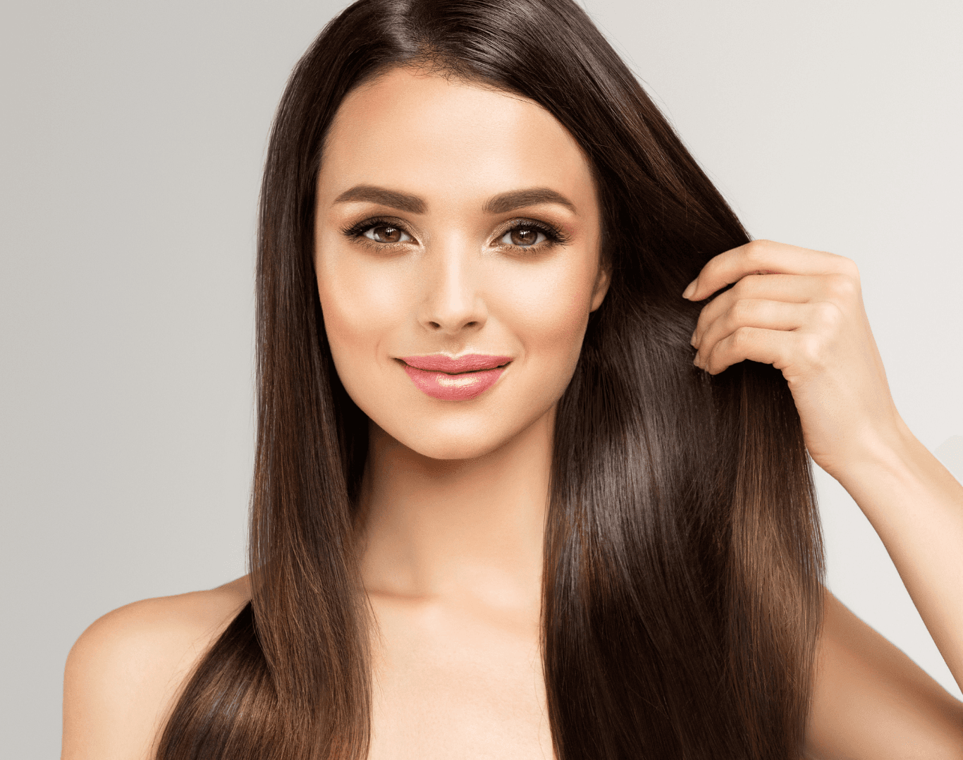 Smiling woman with smooth, shiny hair after an intense conditioning treatment at Directors Cut Hair, Nails and Beauty, Crystal Peaks, Sheffield
