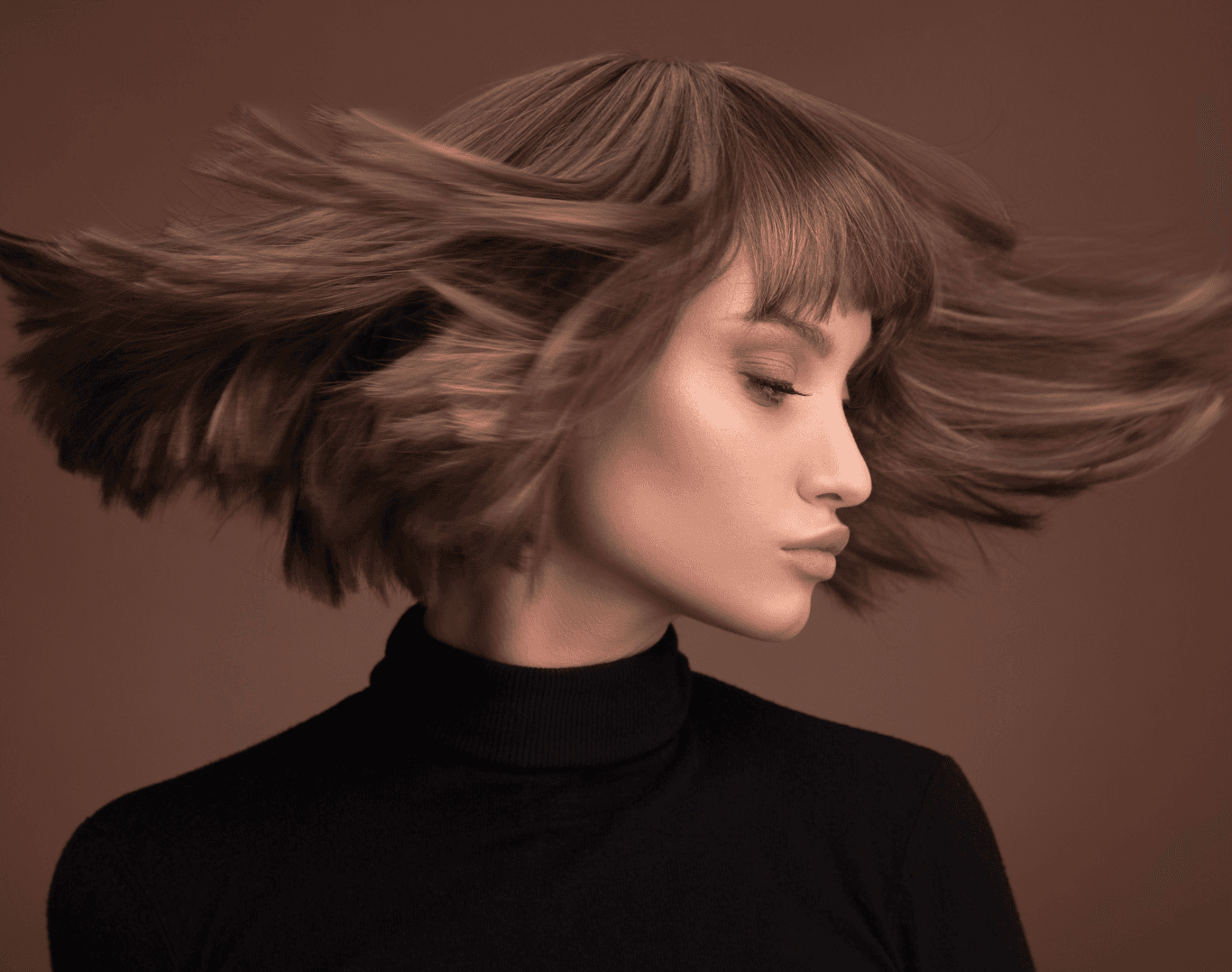 Woman showing off freshly restyled hair after a professional shampoo, restyle, and blowdry at Directors Cut Hair, Nails and Beauty, Crystal Peaks, Sheffield